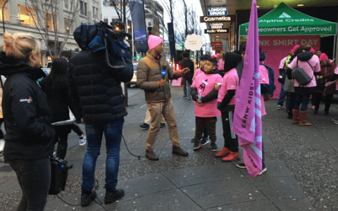pinkshirtday-Volunteers interviewed on the road